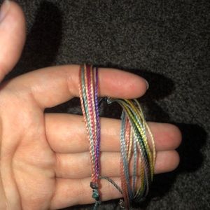 Three pura vida bracelets